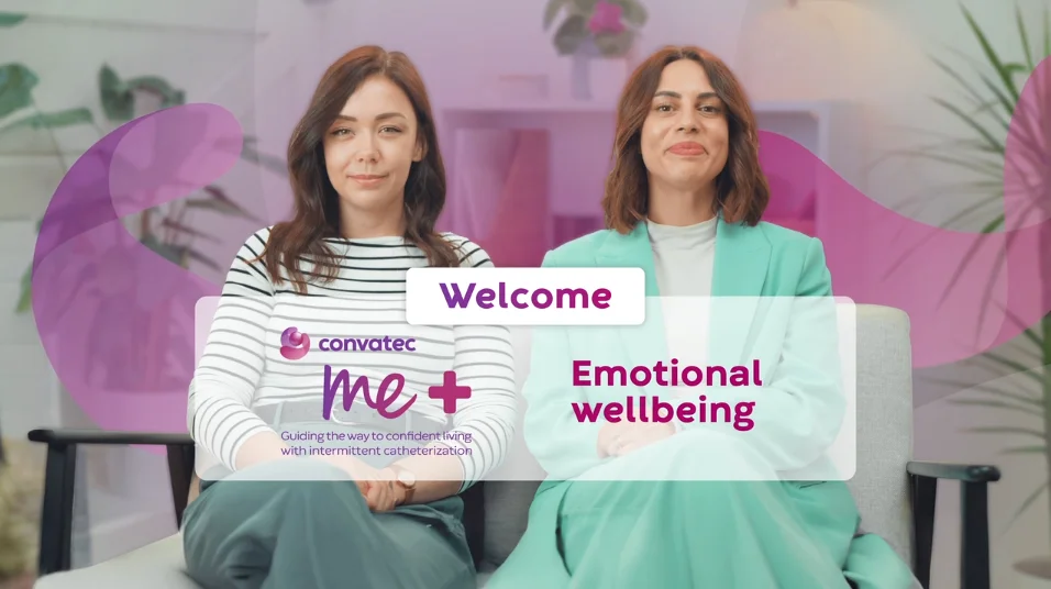 two women sitting on a couch