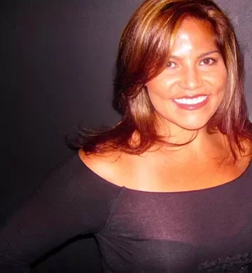 a woman smiling for the camera